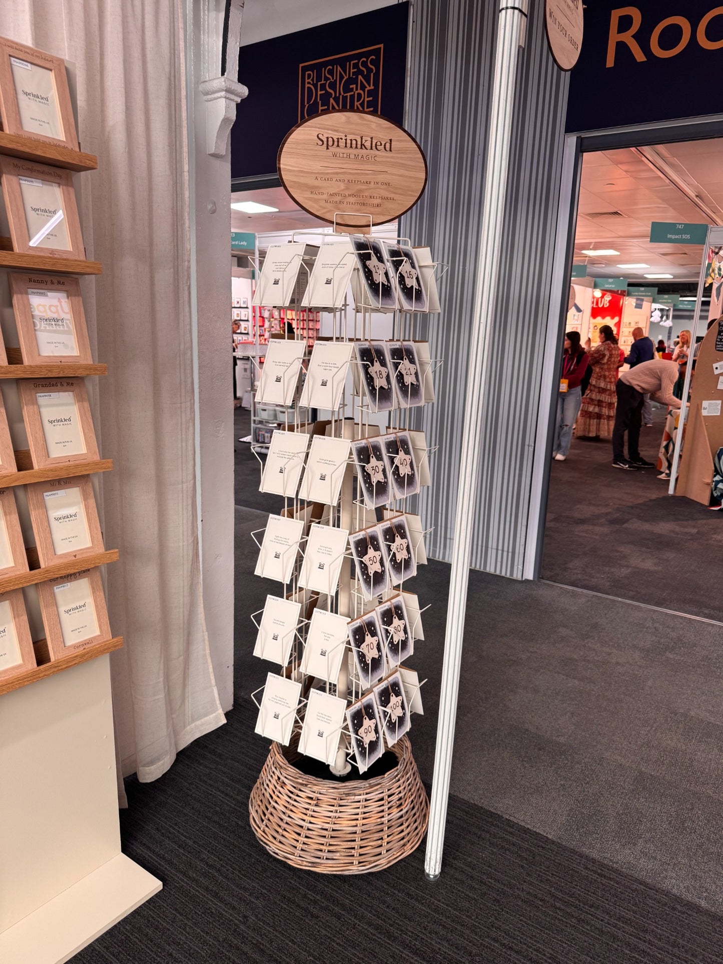Greeting card spinner starter pack shown on a trade stand