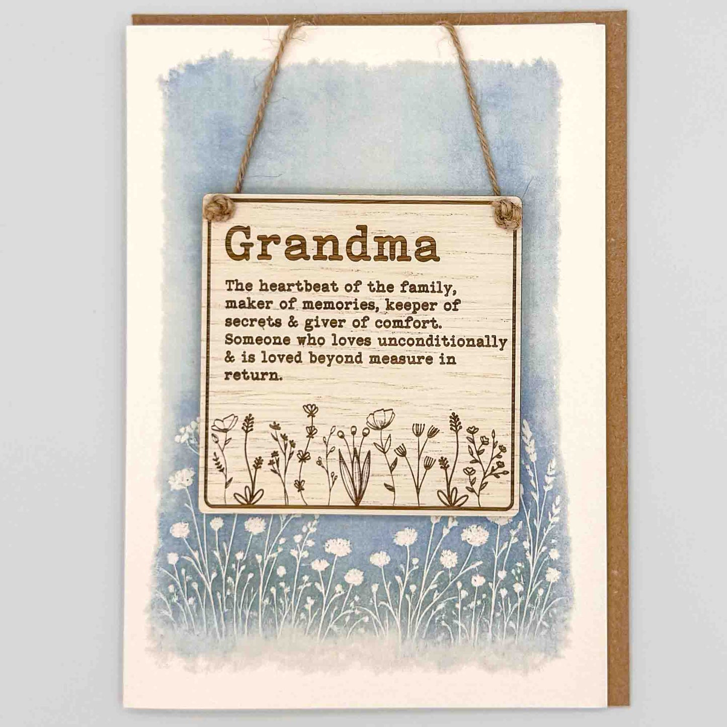 Greeting card with text and floral design on a watercolor background
