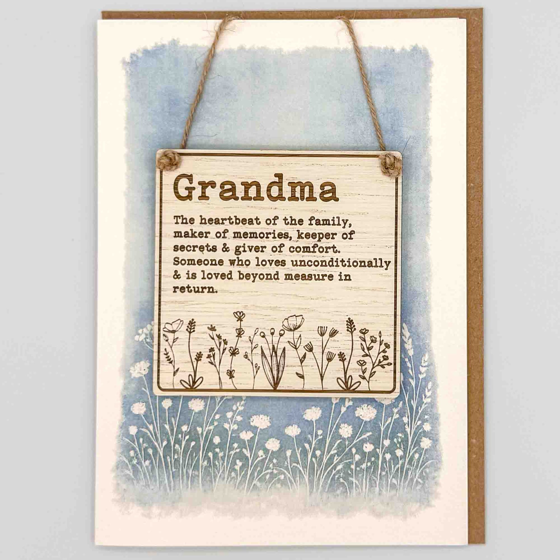 Greeting card with text and floral design on a watercolor background